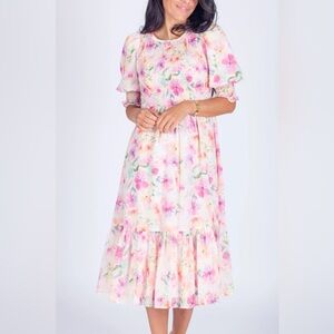 Looking for the Hannah Dress with pink flowers from Yakira Bella. Thank you! 💖